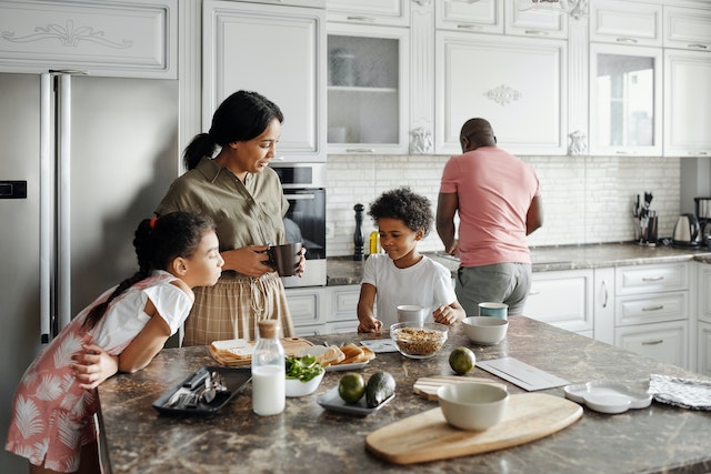 family at home in kitchen